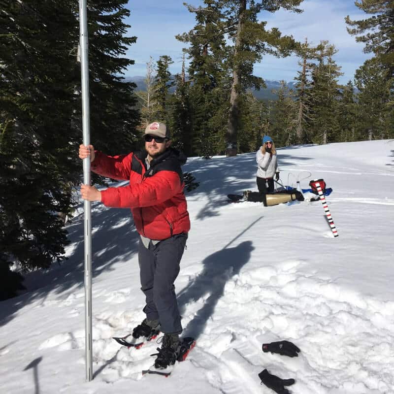 Researcher surveys snowpack at Sagehen Creek Field Station