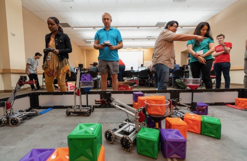 teachers operate robots at 2019 Robotics Academy of Nevada