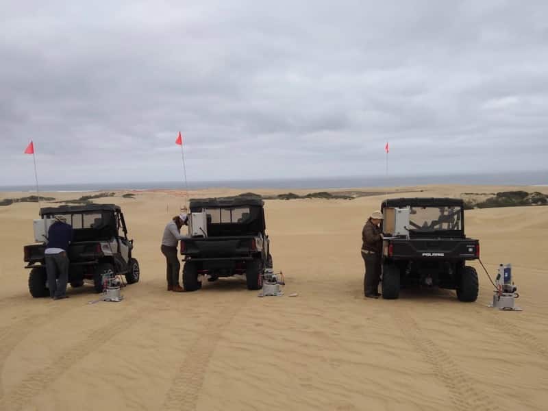 Researchers gather dust emissions data at the Oceano Dunes SVRA using the PI-SWERL. May 2019. Credit: Vic Etyemezian/DRI.