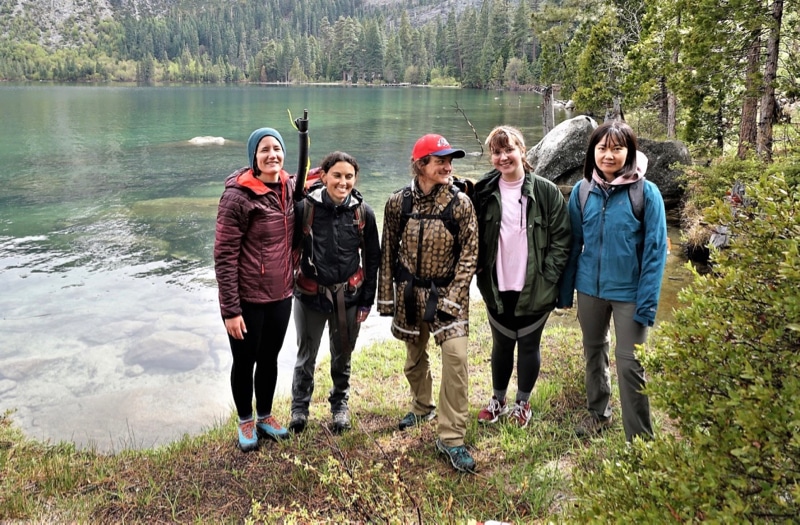 Arienzo (second from left) and the members of the Microplastics Laboratory conduct fieldwork at Lake Tahoe.
