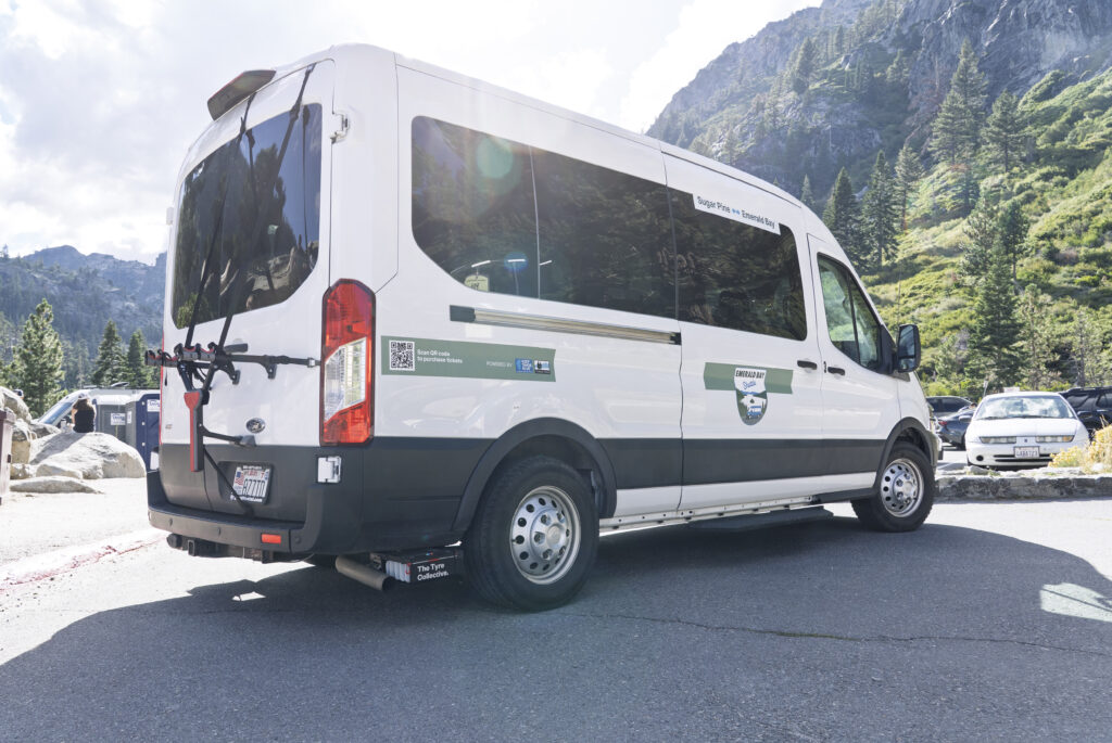 A van parked in a mountain landscape.