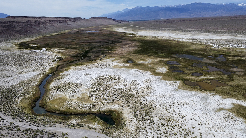 Ariel view of river and mountains.