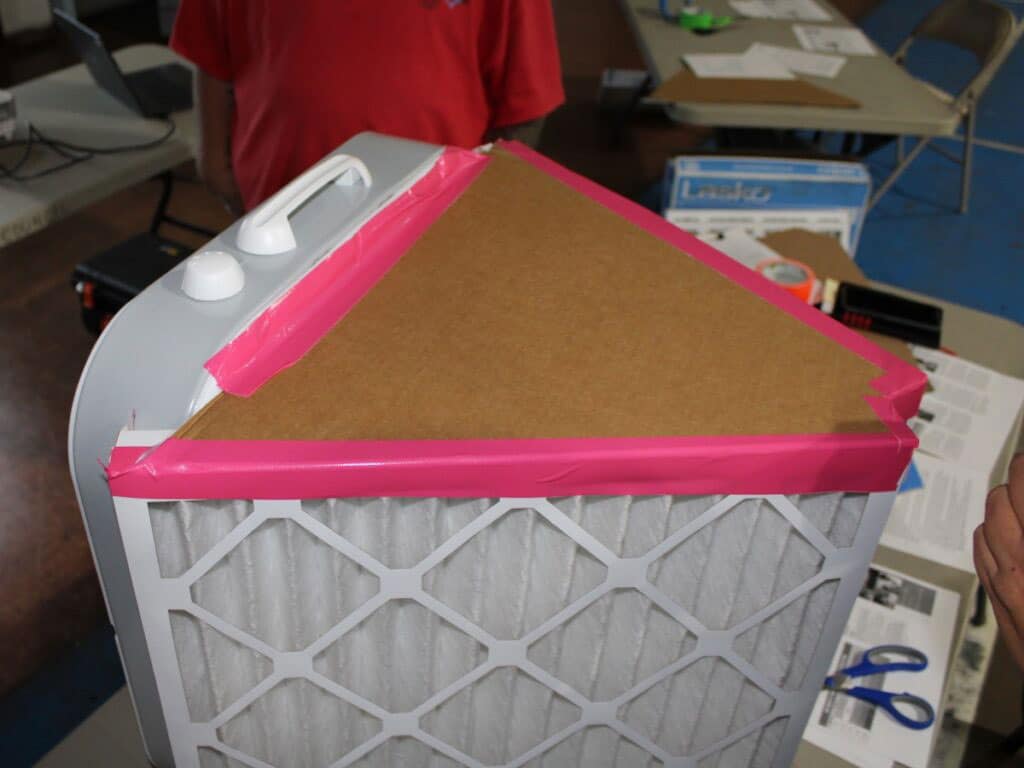 fitting cardboard on top of filters