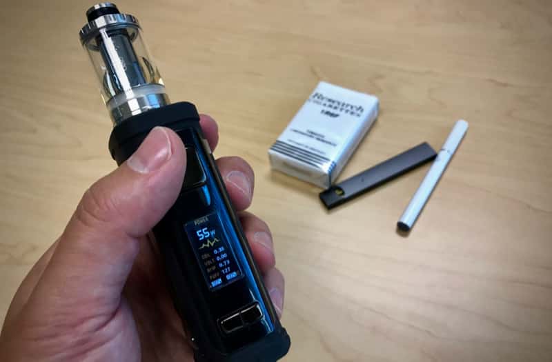 Hand holding an e-cigarette