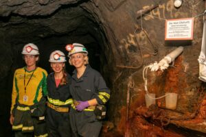 DeMMO field team from left to right: Lily Momper, Brittany Kruger, and Caitlin Casar sampling fracture fluids from a DeMMO borehole installation