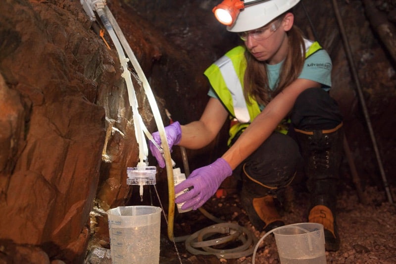 Brittany Kruger collects samples from an underground mine site. 