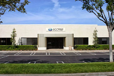 Entrance of the building with a sign that says SCCWRP.