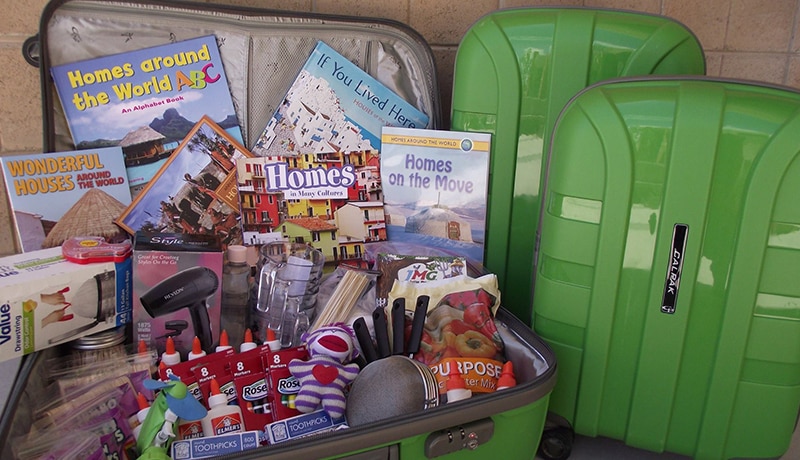 Green box open and showing all the supplies included.