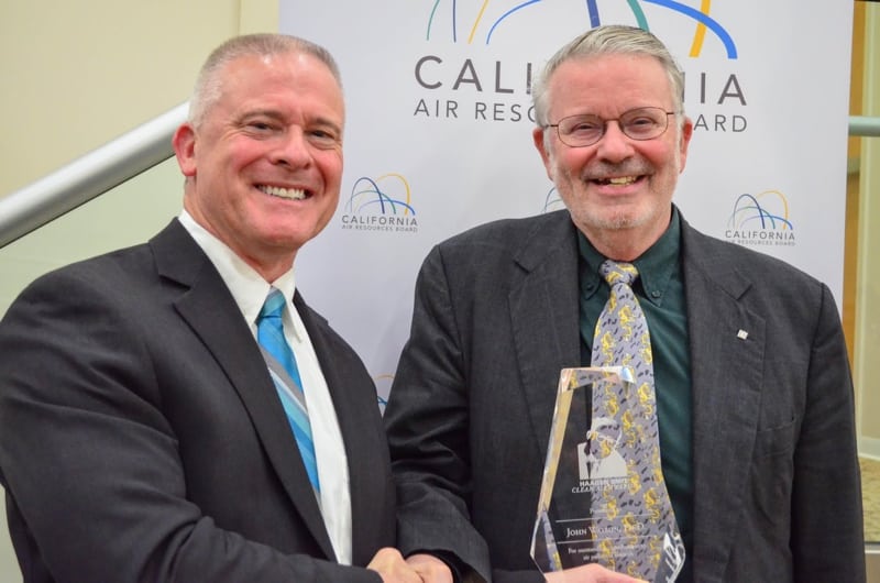 Richard Corey (on left) of the California Air Resources Board congratulates DRI scientist John Watson (on right) on the receipt of the Haagen-Smit Award for air quality research