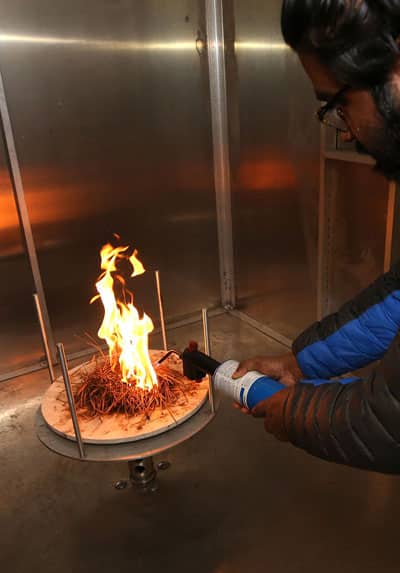 Deep Sengupta burns fuel at the Desert Research Institute, in Reno, Nev., on Wednesday, Feb. 21, 2018. Photo by Cathleen Allison/Nevada Momentum
