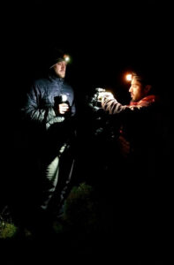 scientists working in the dark