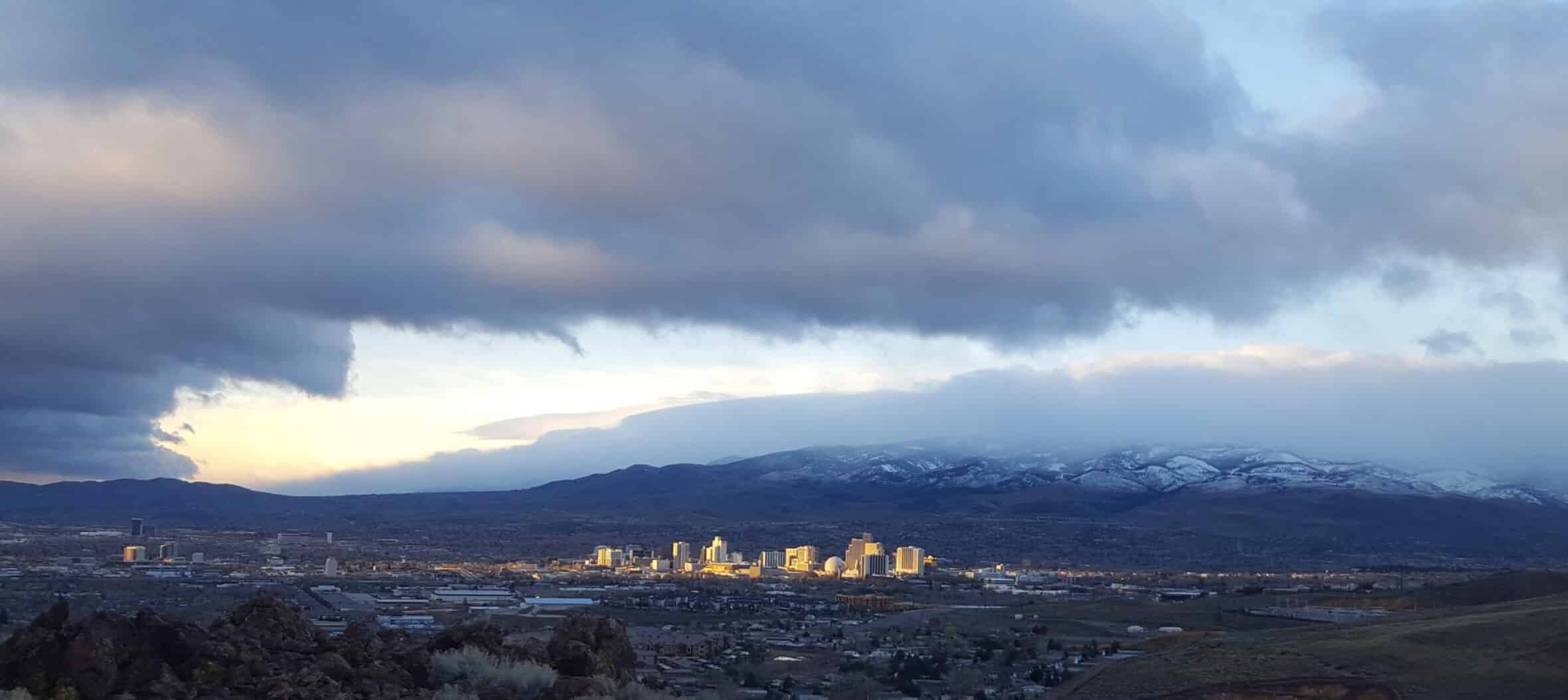 Downtown Reno and the Sierra Nevada with clouds overhead. Credit: NWS Reno