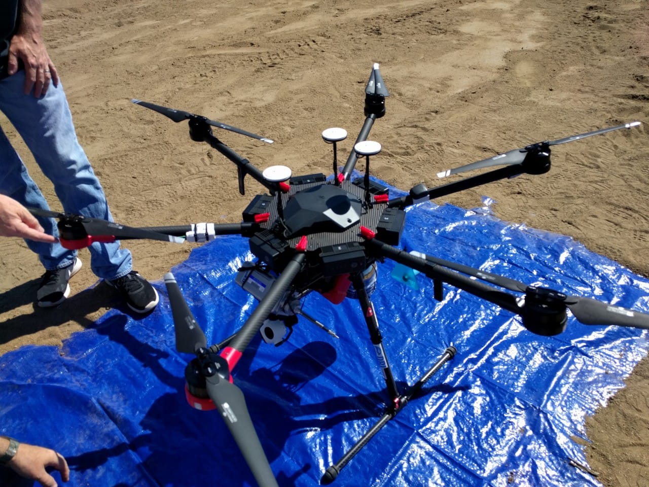 Drone-based Remote-sensing Experiments and Atmospheric Measurements